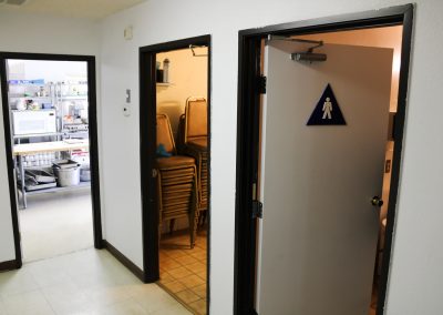 A view of the Restrooms, and Kitchen Entrance, High Desert Hall, Hesperia, CA.