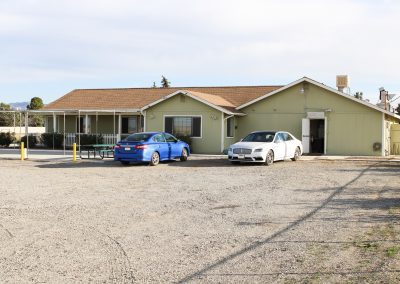 A view from the parking lot, looking towards the service door entrance, High Desert Hall, Hesperia, CA.